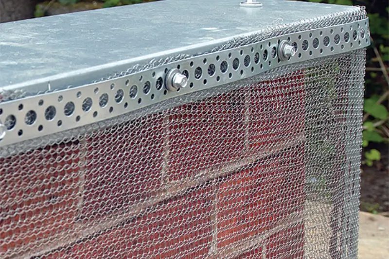Flexi Armour steel mesh protecting a chimney from wildlife access