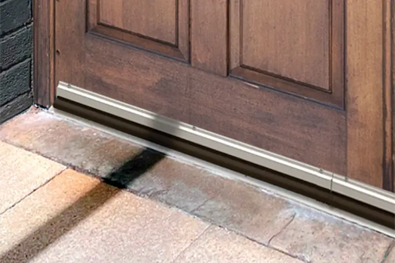 A door with a pest proof Flexi Armour door sweep.