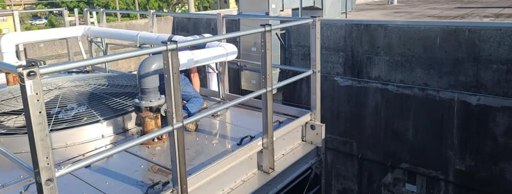 Pest technician inspecting an HVAC system